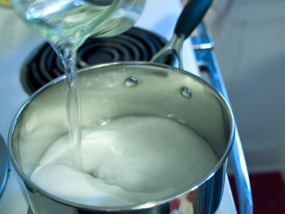 bringing sugar and water to a boil